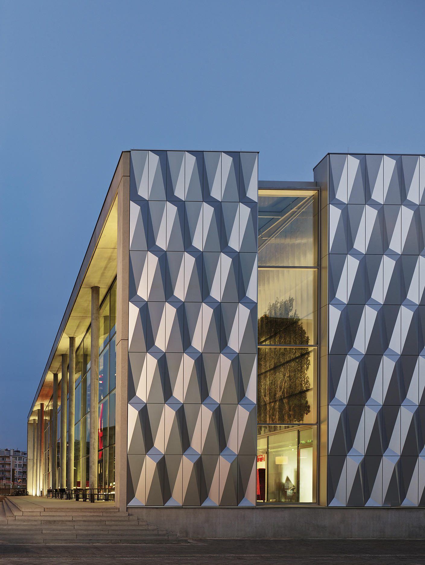 Aluminum composite material (ACM) panels are a popular choice for exterior facade cladding, offering a combination of aluminum and low-density core materials. These lightweight, yet robust panels provide high durability and resistance to weathering, making them ideal for outdoor applications. The aluminum outer layers protect the core from moisture and enhance the panel's fire resistance, while the smooth surface allows for a variety of finishes, including metallic, solid colors, or even custom prints. ACM panels are easy to install and maintain, providing a cost-effective and visually appealing solution for modern architectural facades..jpg Aluminum composite material (ACM) panels are a popular choice for exterior facade cladding, offering a combination of aluminum and low-density core materials. These lightweight, yet robust panels provide high durability and resistance to weathering, making them ideal for outdoor applications. The aluminum outer layers protect the core from moisture and enhance the panel's fire resistance, while the smooth surface allows for a variety of finishes, including metallic, solid colors, or even custom prints. ACM panels are easy to install and maintain, providing a cost-effective and visually appealing solution for modern architectural facades..jpg